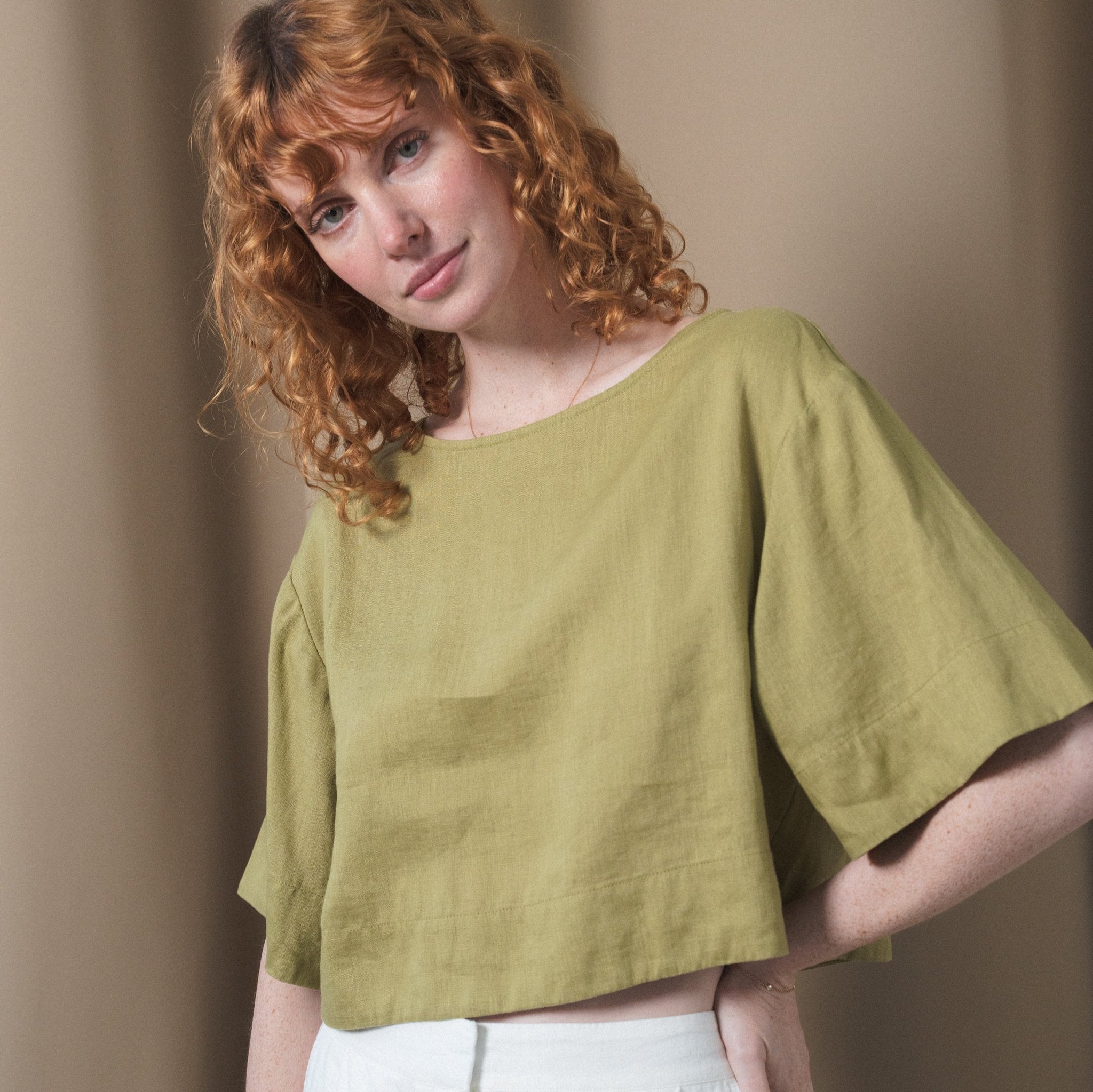 LILLY PILLY model wears Maya linen top in Olive paired with Oli pants in Ivory